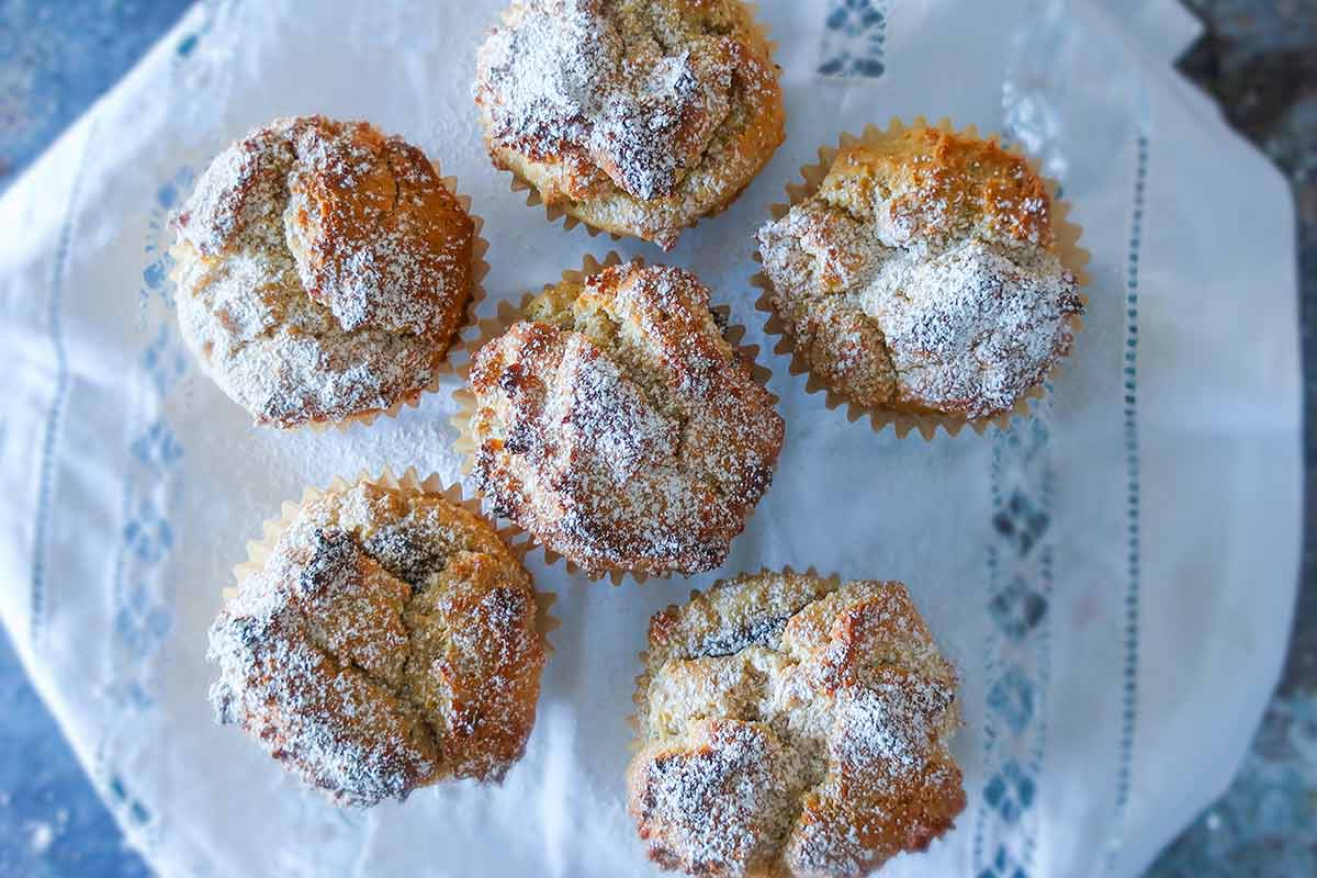  gluten free fig muffins dusted with powdered sugar
