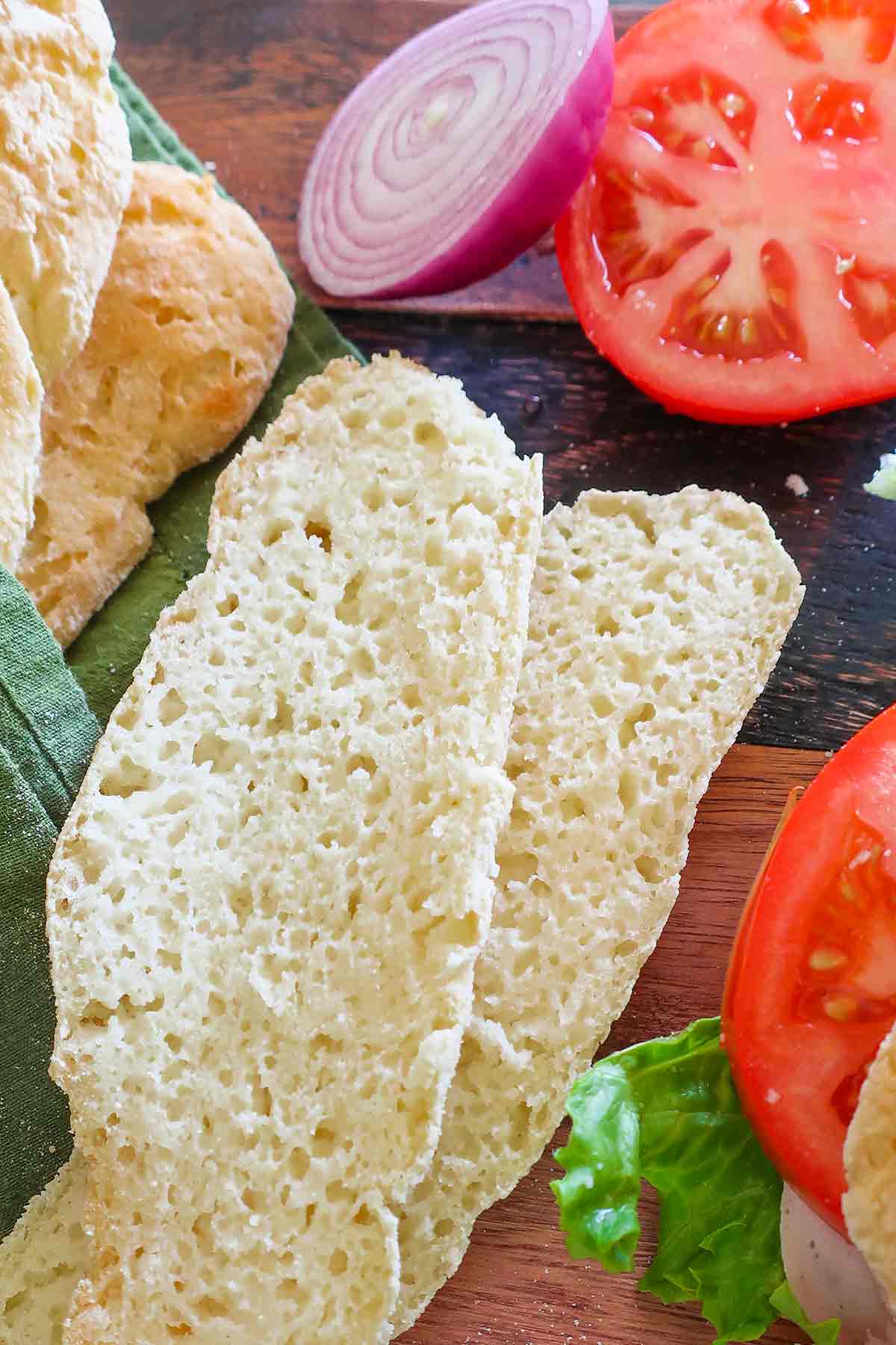 showing the inside of sliced sub rolls with a tender texture