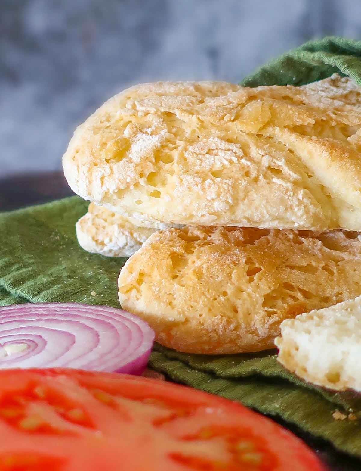 showing whole baked sub rolls