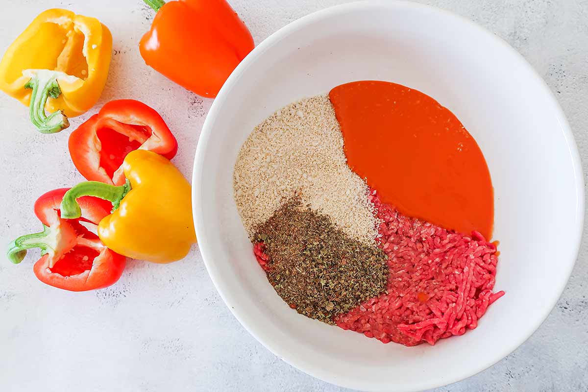 bowl with ground meat, GF breadcrumbs, tomato soup, seasoning