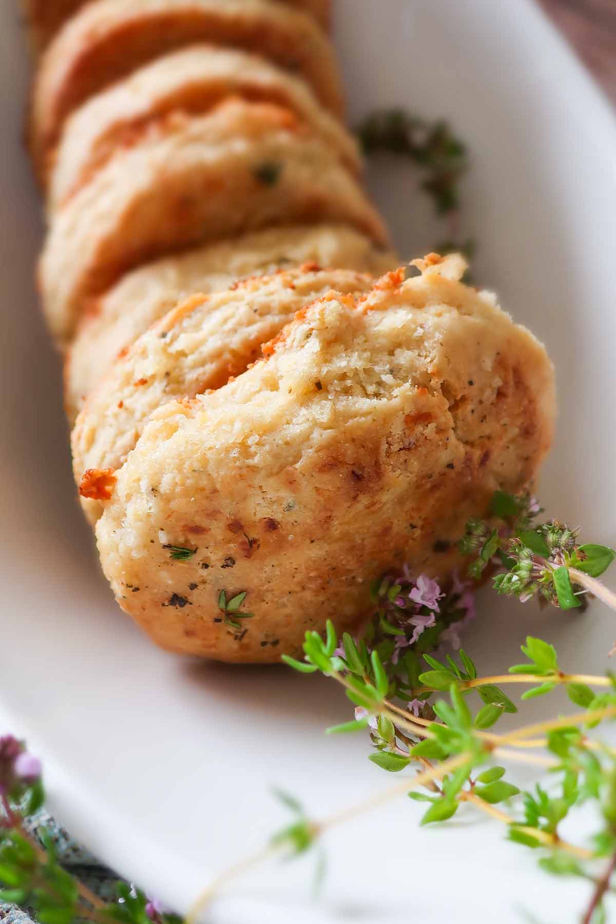 biscuits in a bowl garnished with fresh thyme