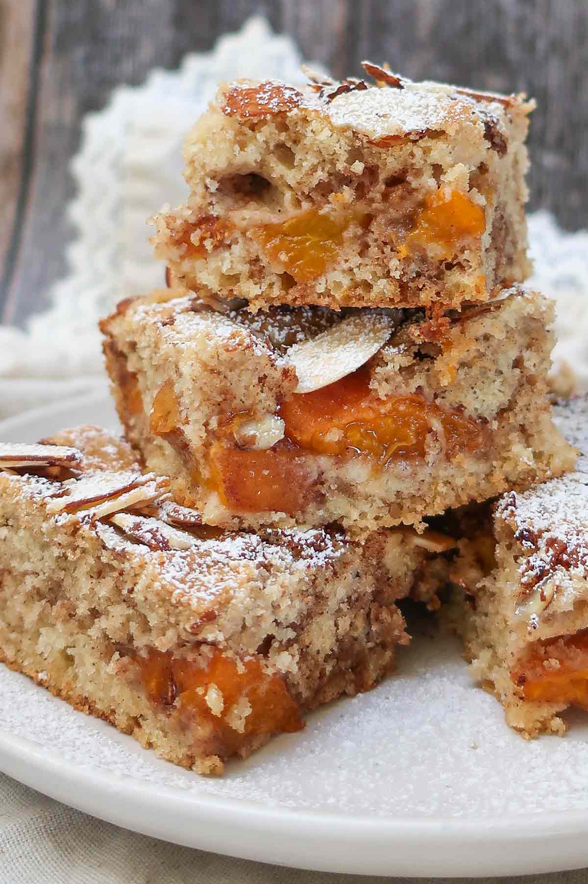 stacked slices of farmer's apricot cake on a plate