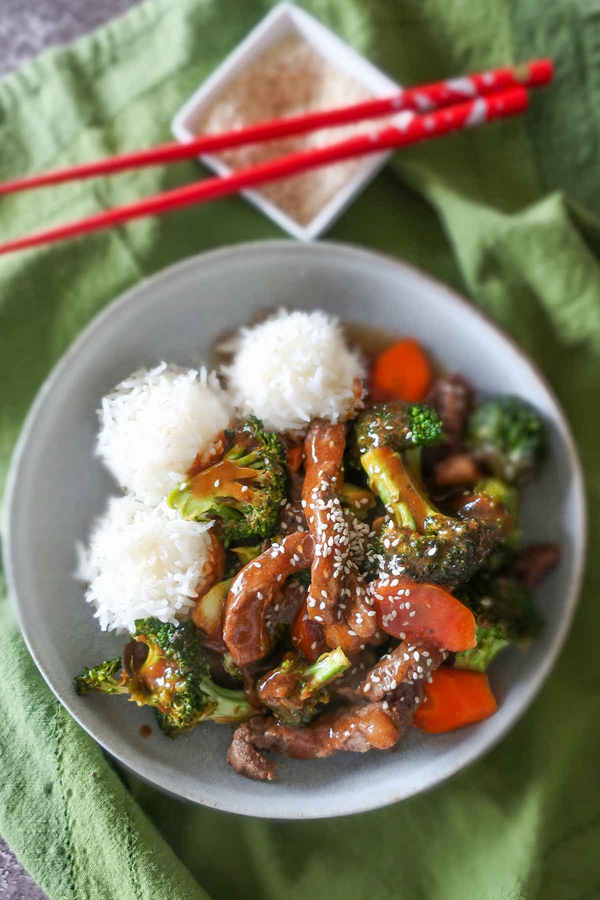 top view of Asian-style beef and broccoli with rice on a plate