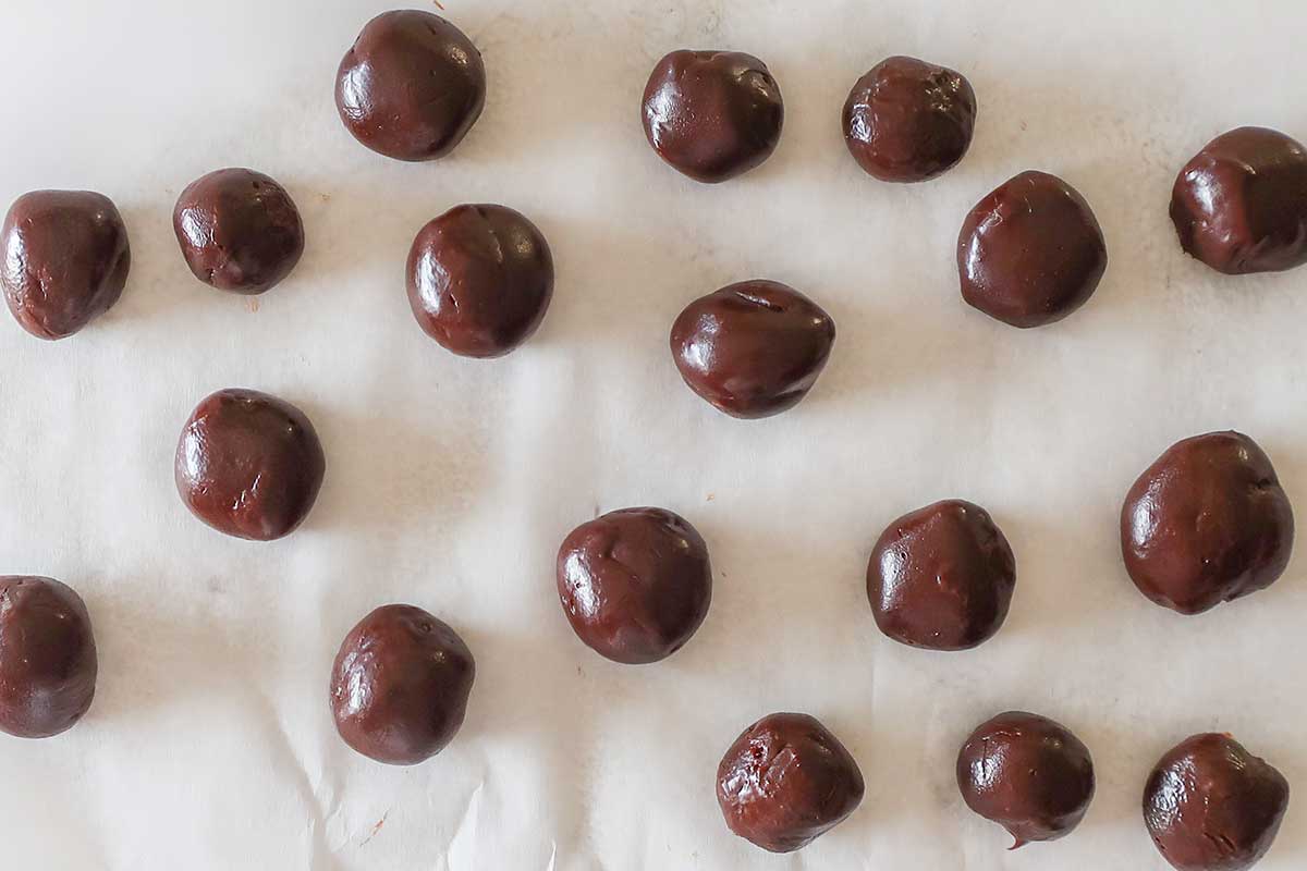 chocolate balls on parchment paper