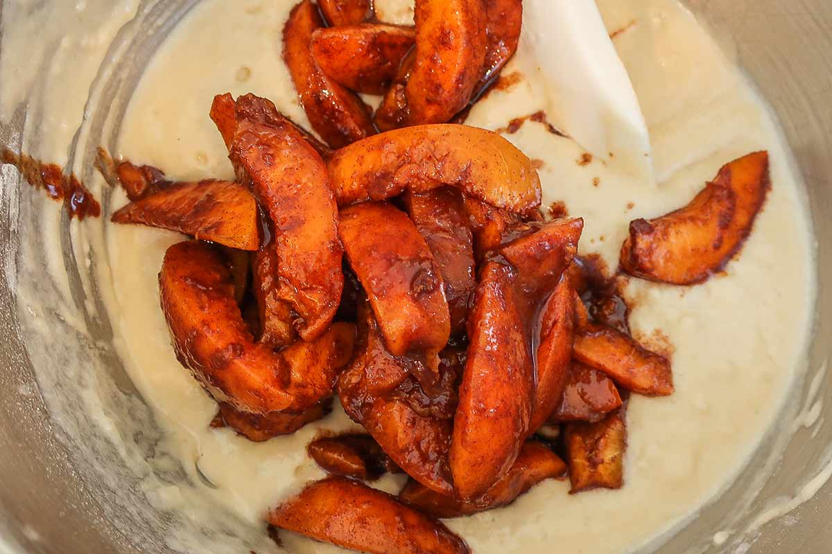 adding apricots into batter