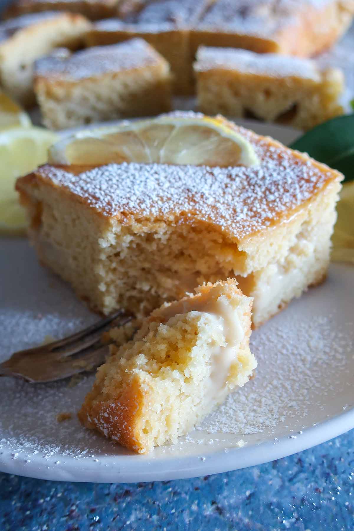 slice of vanilla cake showing custard filling