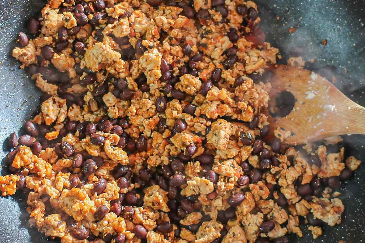 mixed ground chicken, black beans and tomato sauce