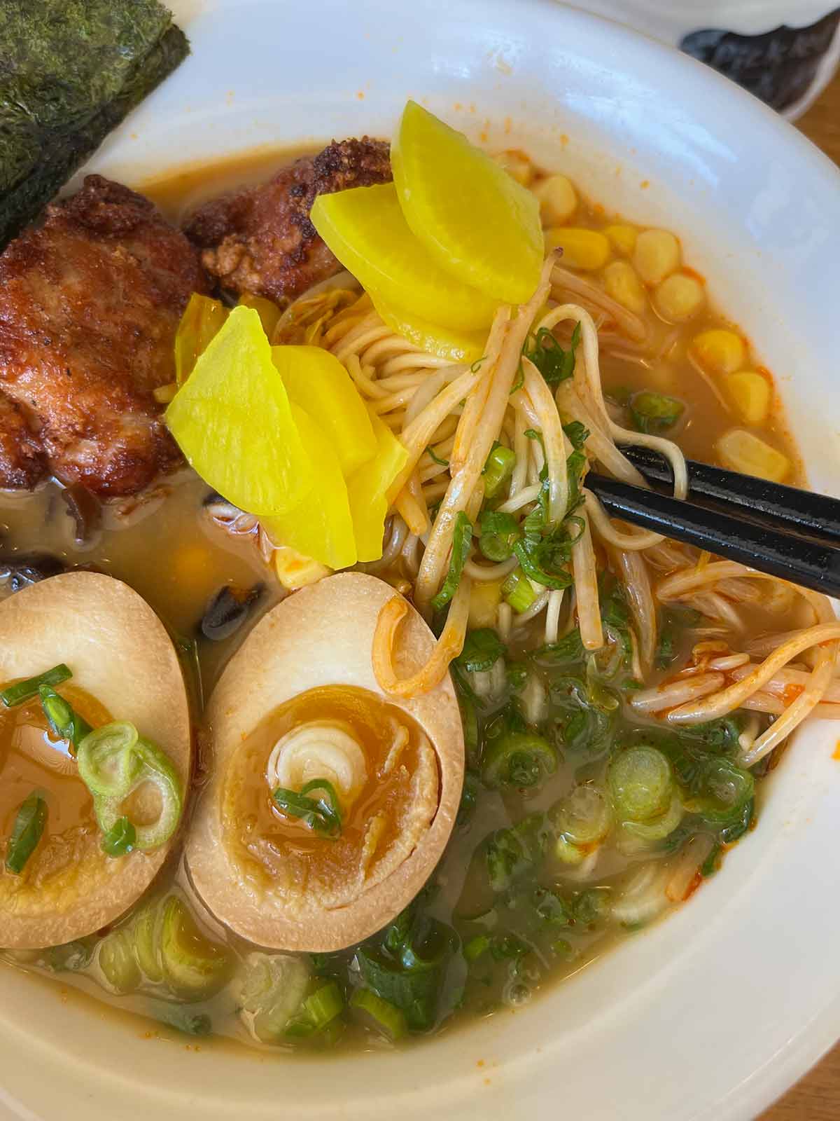 gluten free spicy ramen soup with chicken Karaage and boiled egg on top