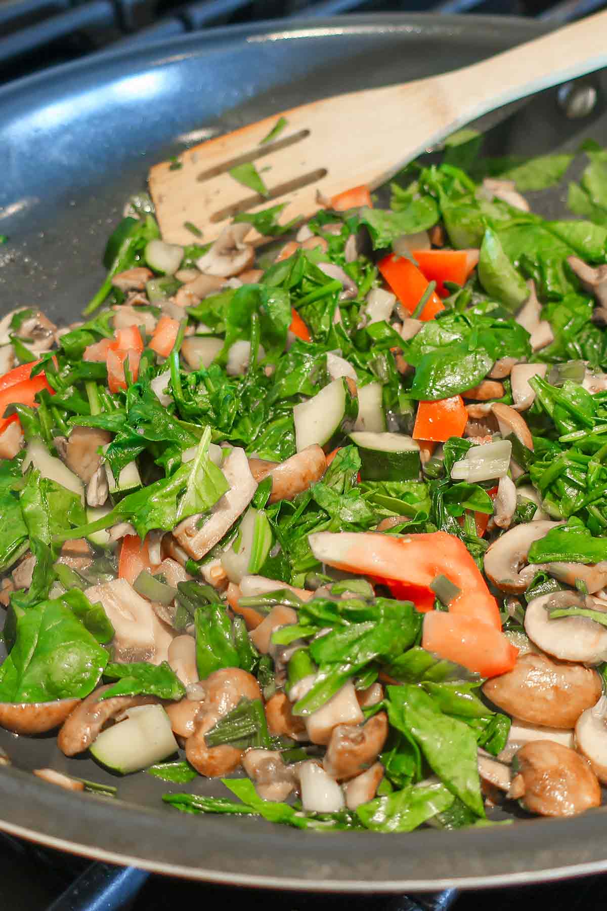 sautéing veggies in a skillet