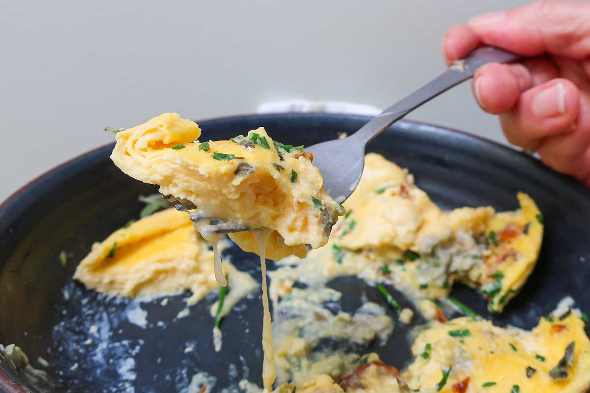 fork filled with 3 minute microwaved omelet