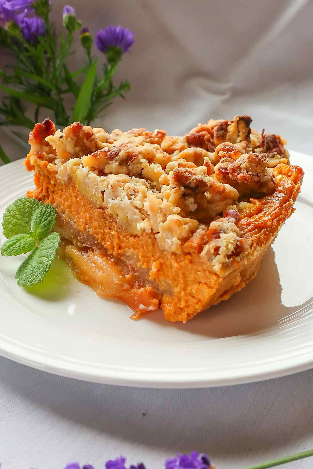 a slice of Gluten-Free Apple Pumpkin Crisp Pie