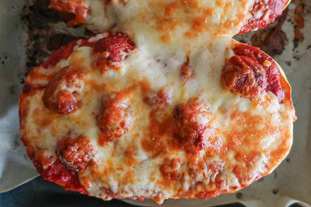 baked spaghetti squash boats with filling and cheese