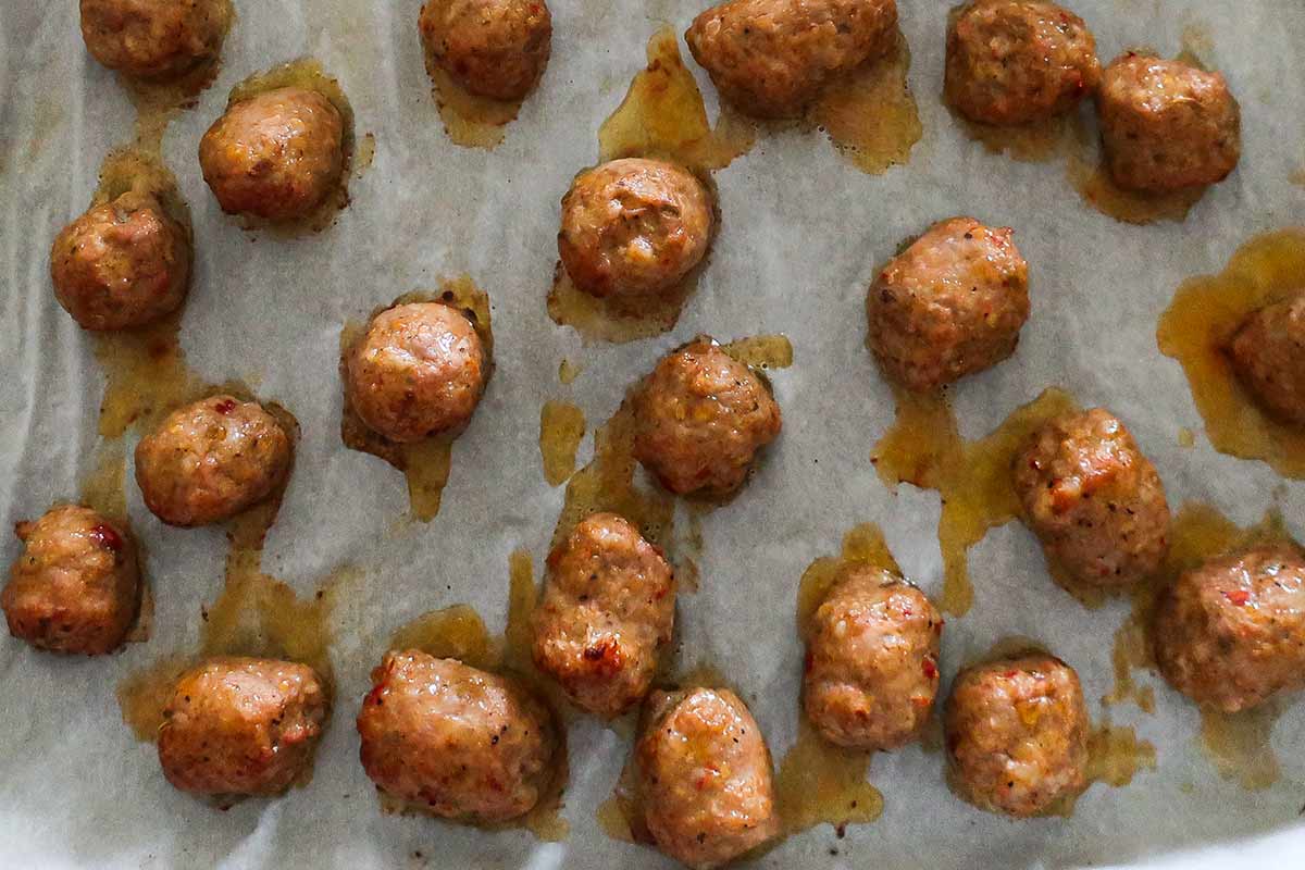 baked meatballs on a baking tray