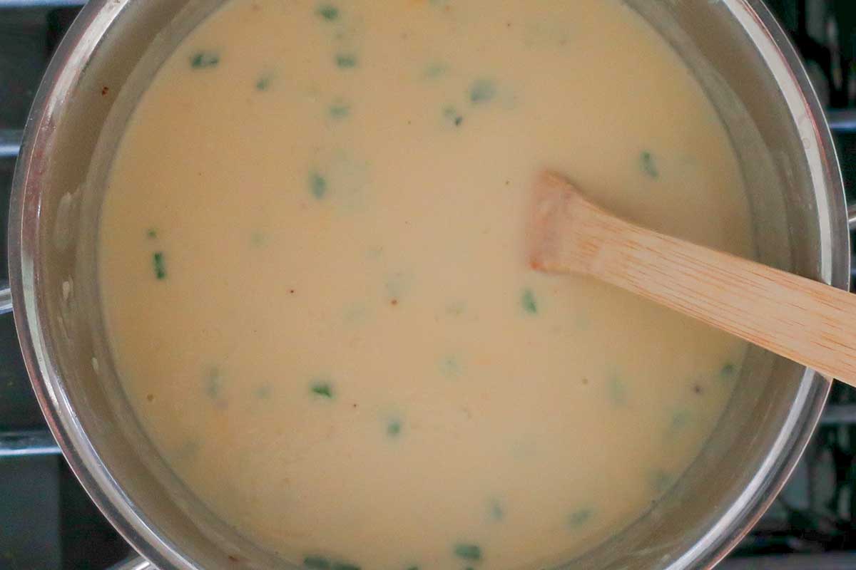 cheese cauliflower soup in a soup pot