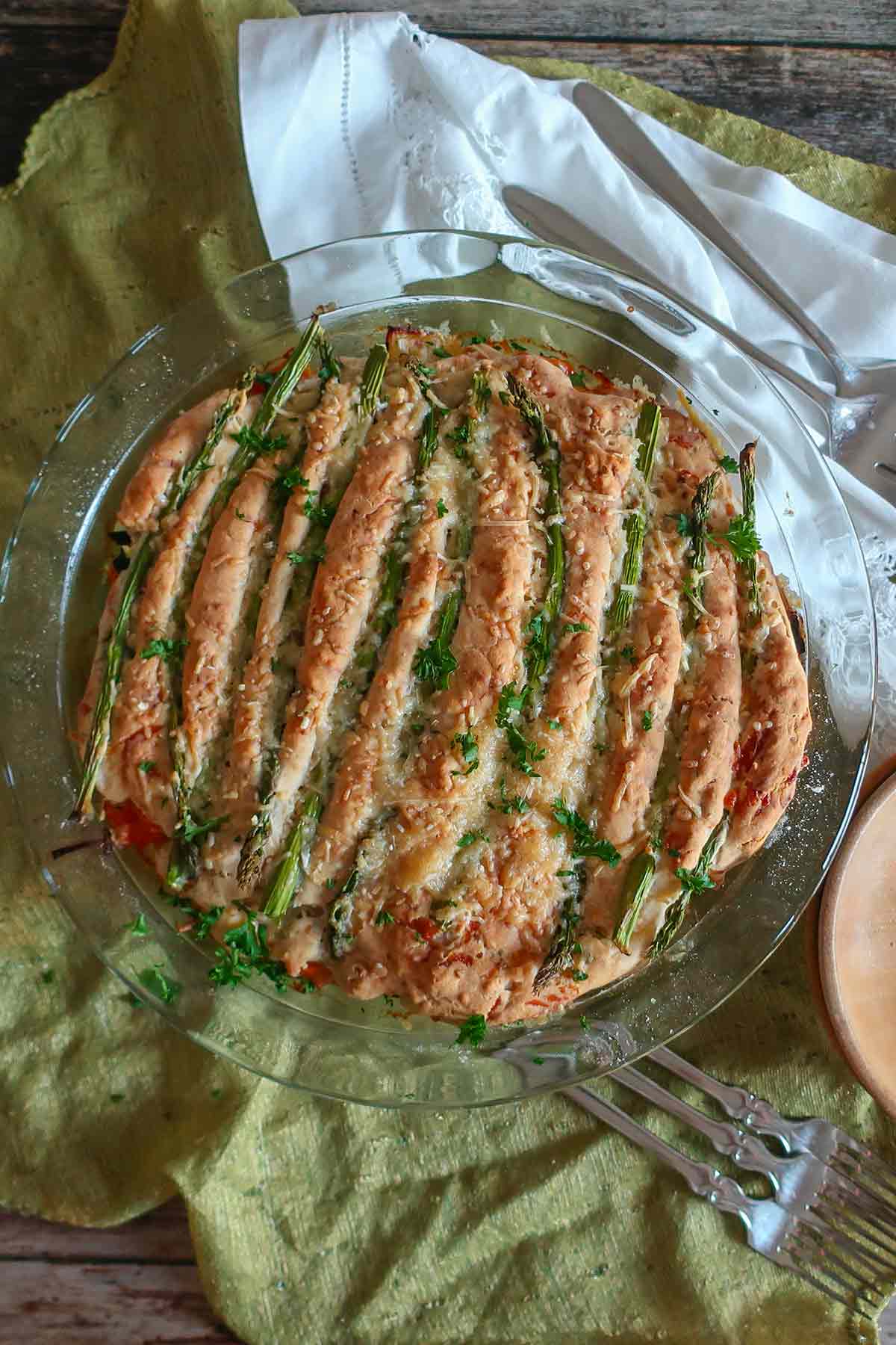 whole veggie pie with cheesy biscuit topping and asparagus