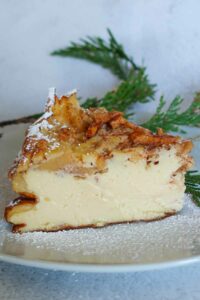 a slice of Apple Sour Cream Custard Cake on a plate