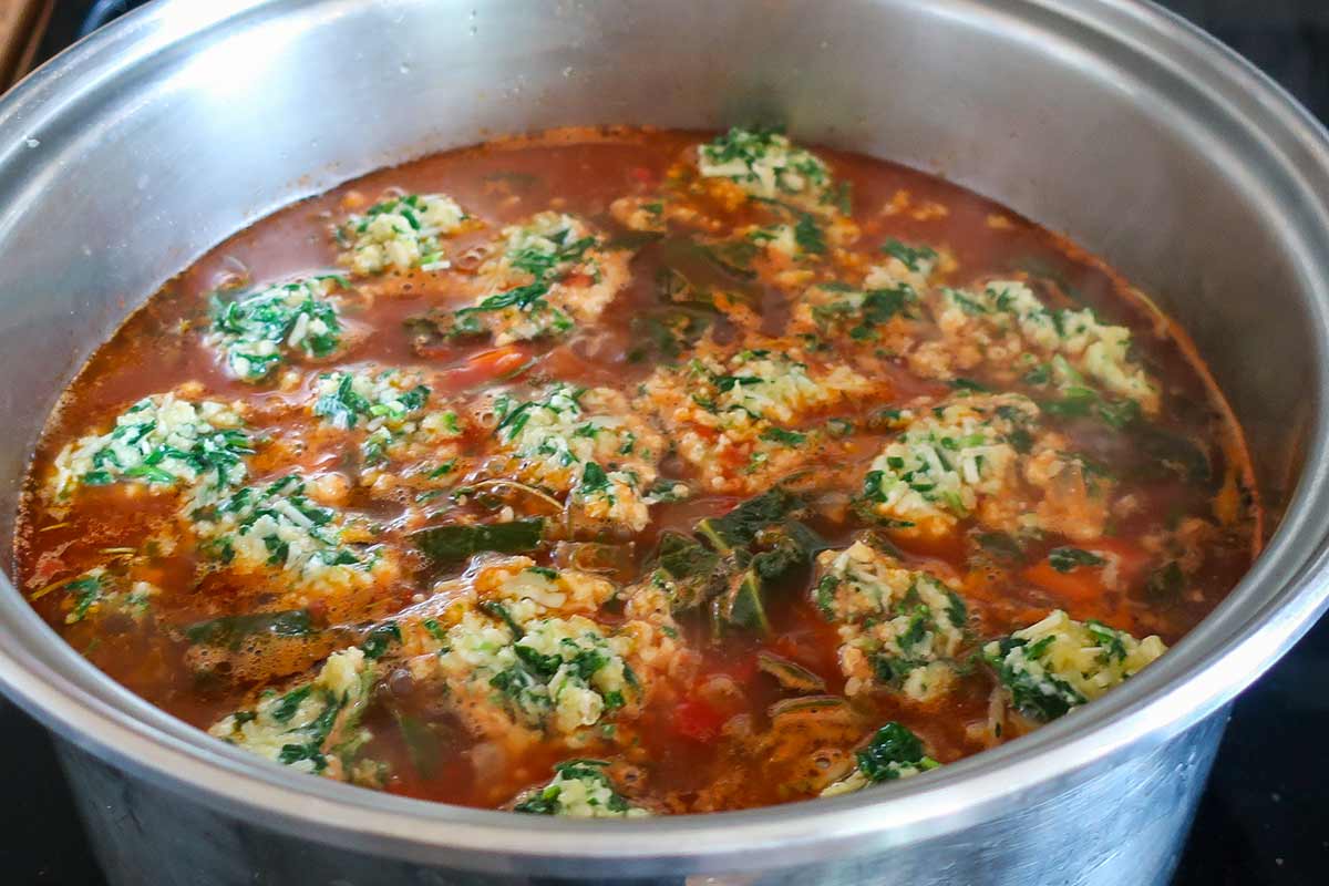 dumplings simmering in the soup 