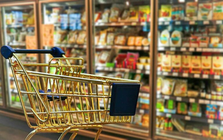 empty shopping cart in a grocery store