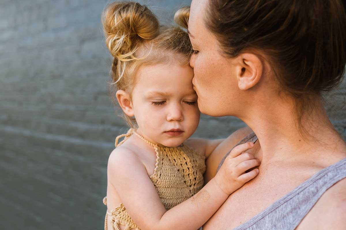 mother holding a child