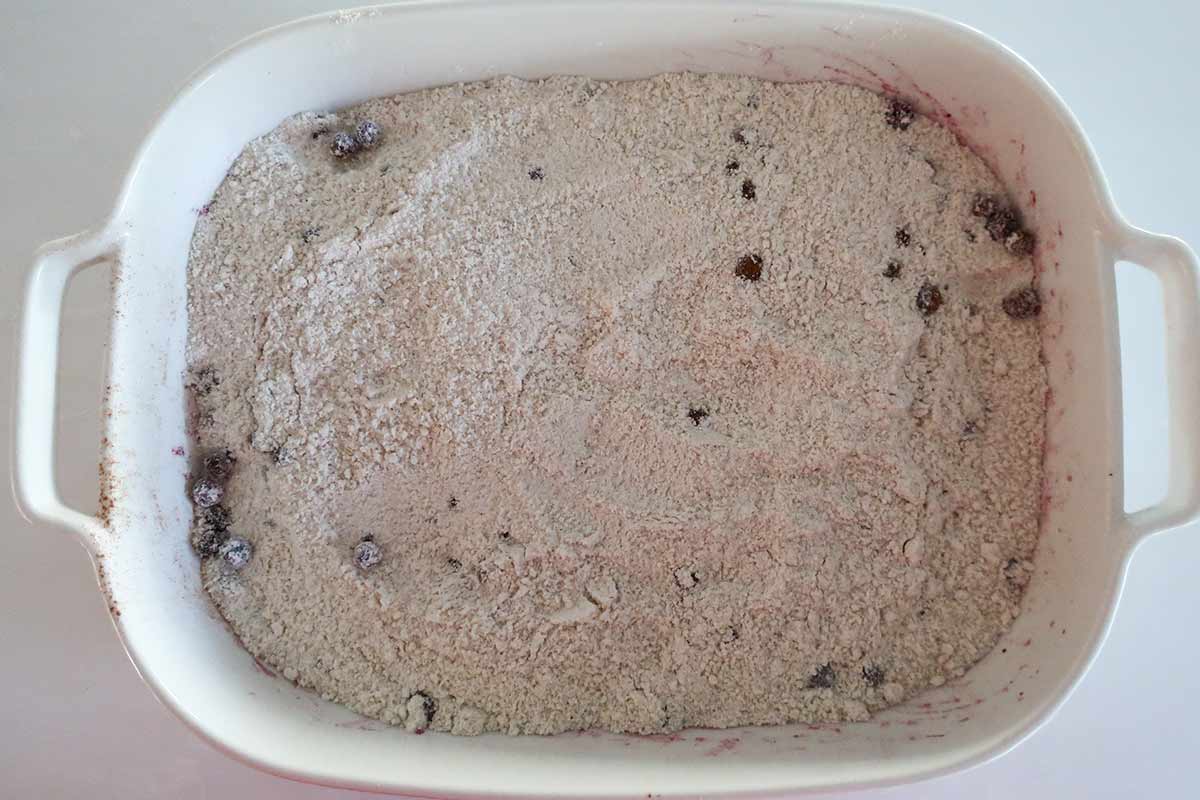 blueberry dump cake dry gluten free topping on top of blueberries
