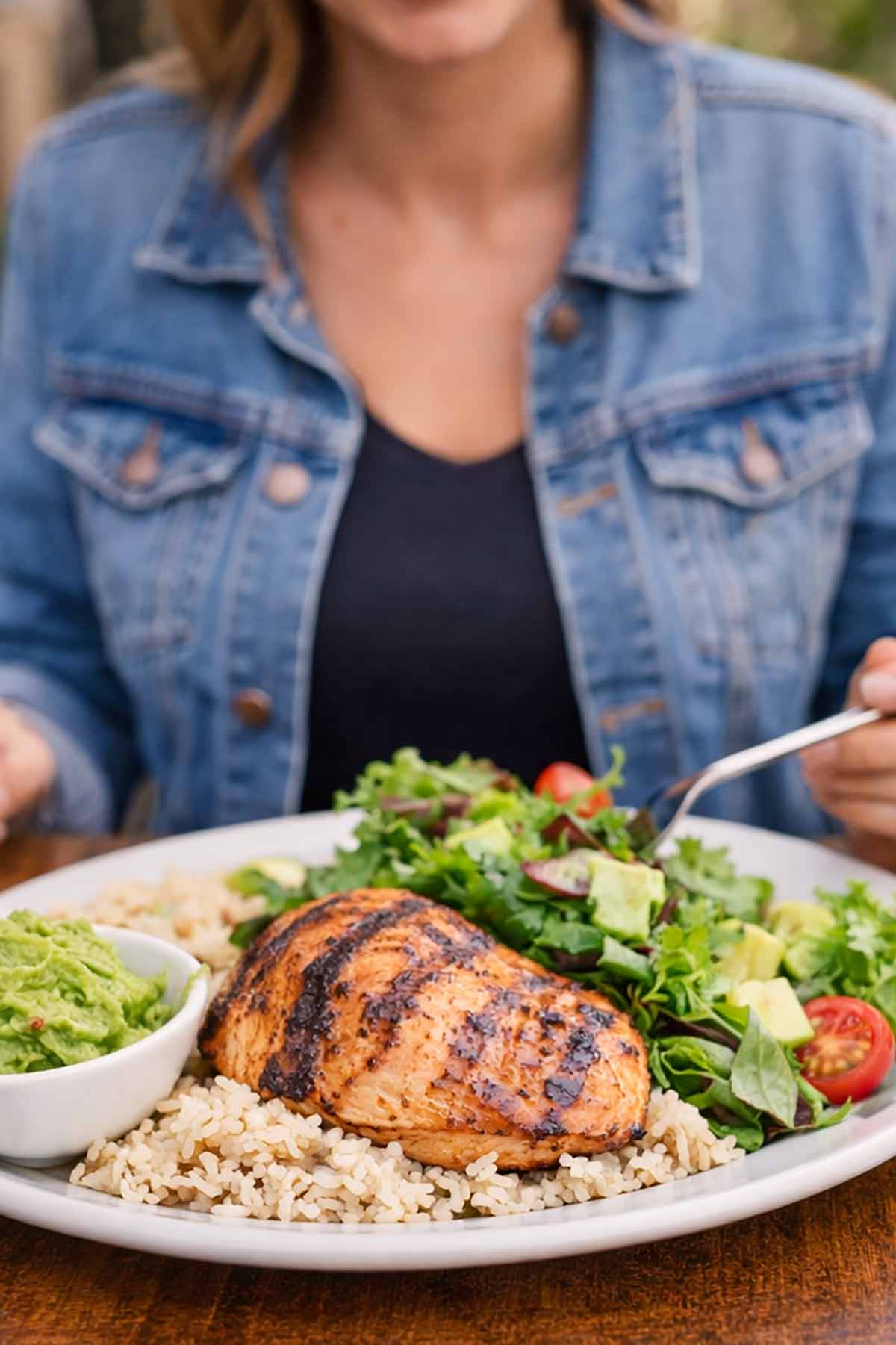Safe gluten-free restaurant meal with grilled fish, vegetables, and rice