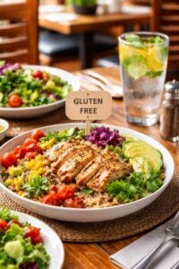 Gluten-free dining at a restaurant with salad and grilled chicken
