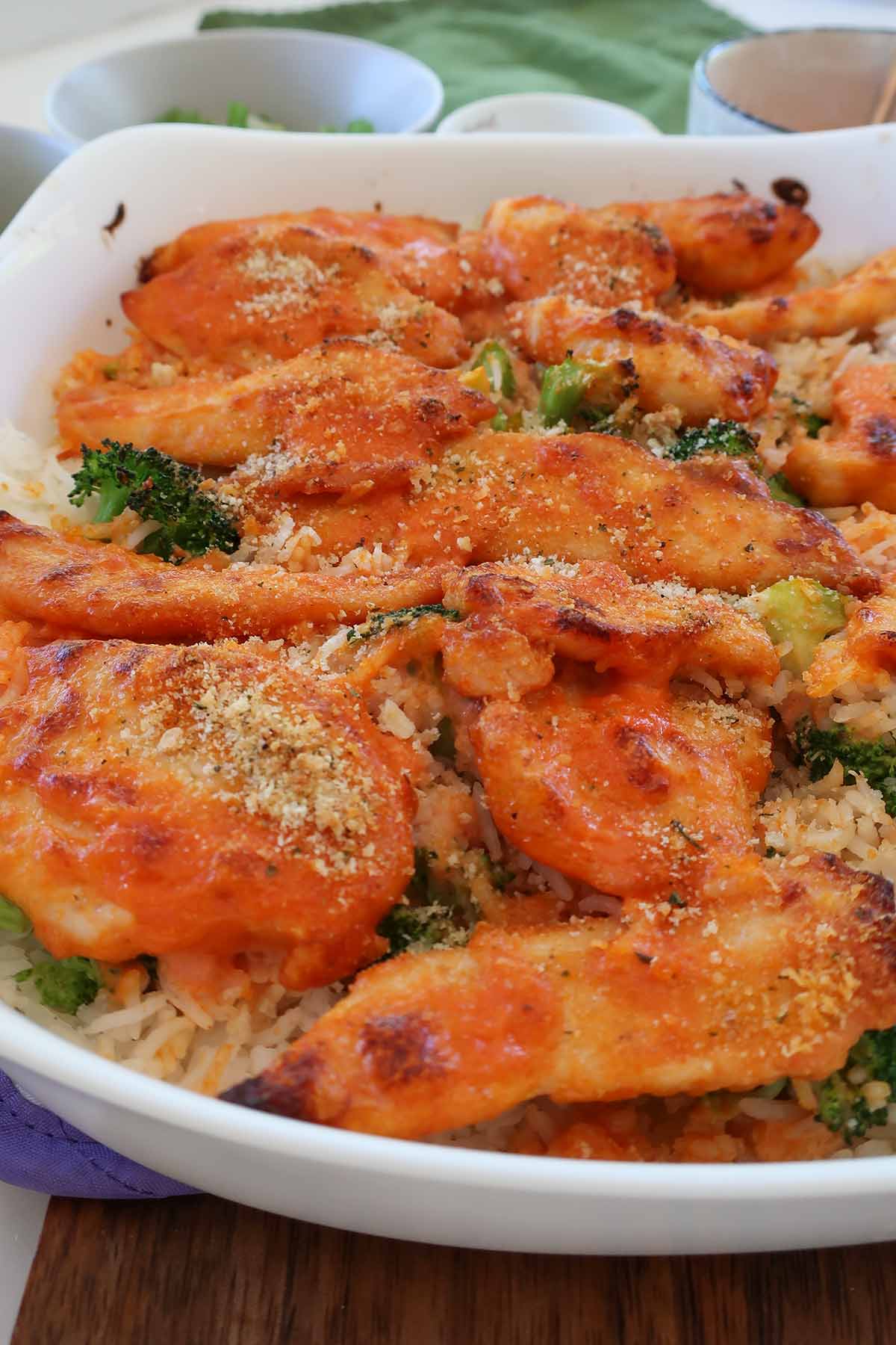 bang bang chicken casserole in a dish right after baking before the sauce is added on top