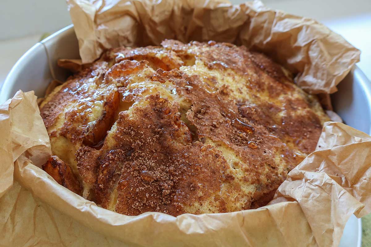 Flourless custard cake fully baked and risen in springform pan
