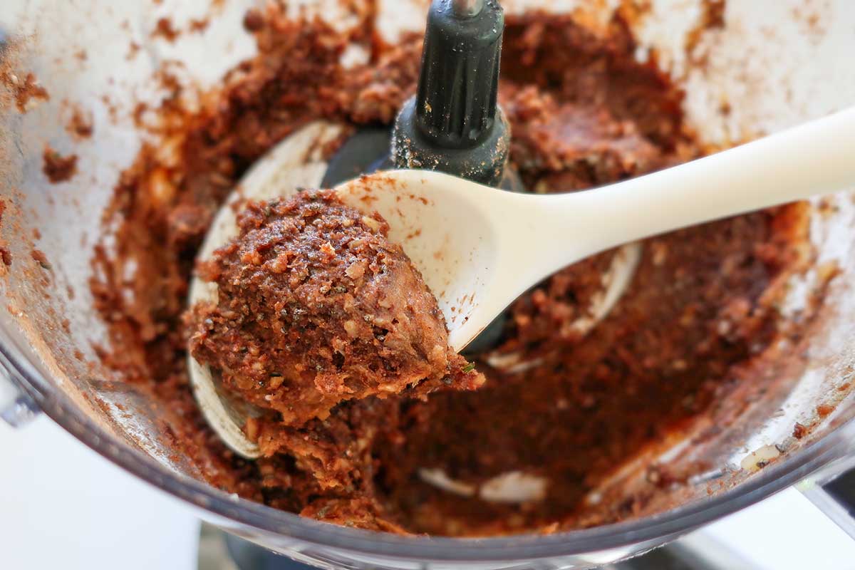 all the ingredients in a food processor processed into a paste
