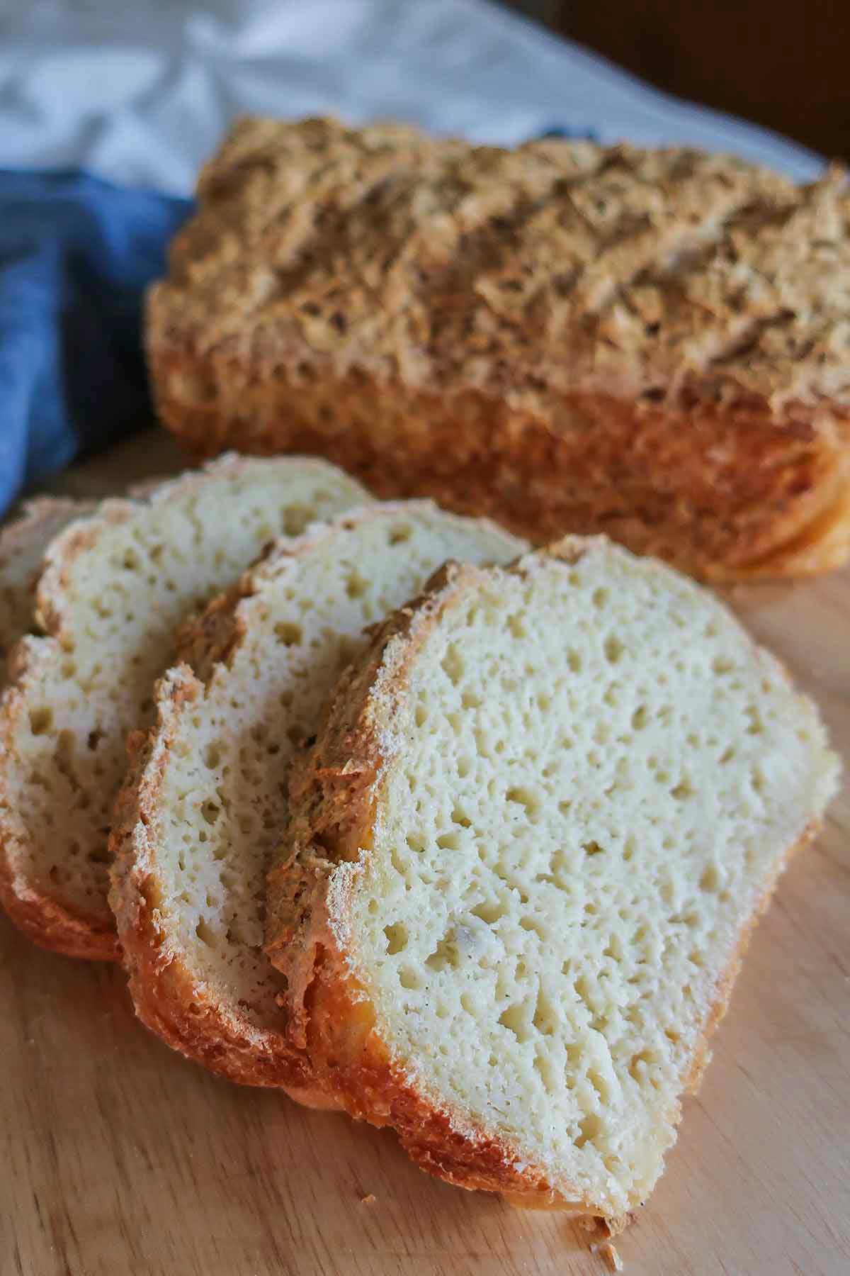 freshly baked gluten-free German bread sliced showing moist and light crumb