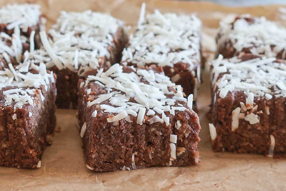 Fudgy No-Bake Chocolate Date Bars with Coconut and Pecans with moist fudgy crumb