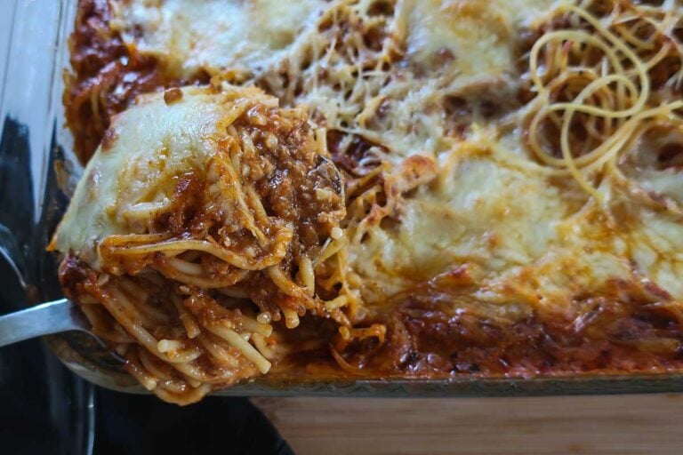 Vegetarian Gluten-Free Million Dollar Spaghetti Bake in a rich creamy mushroom sauce topped with dollops of melted cheese