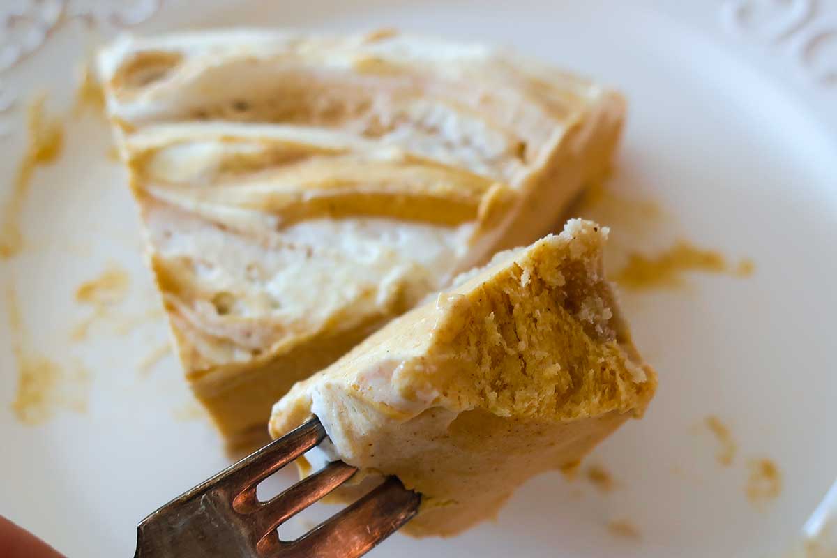 a slice of frozen No-Bake Gluten-Free Pumpkin Pie with Almond Flour Crust on a fork