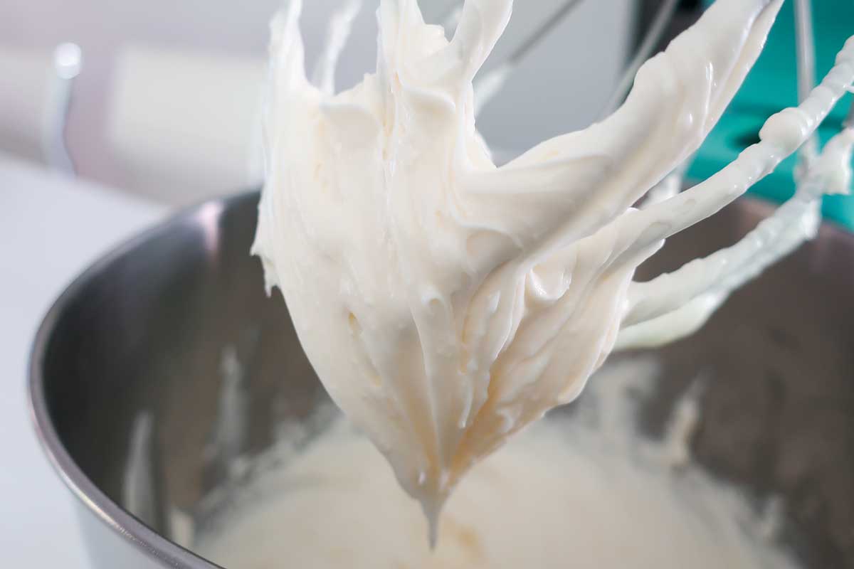 whipped cream cheese with sugar into a lump free creamy texture
